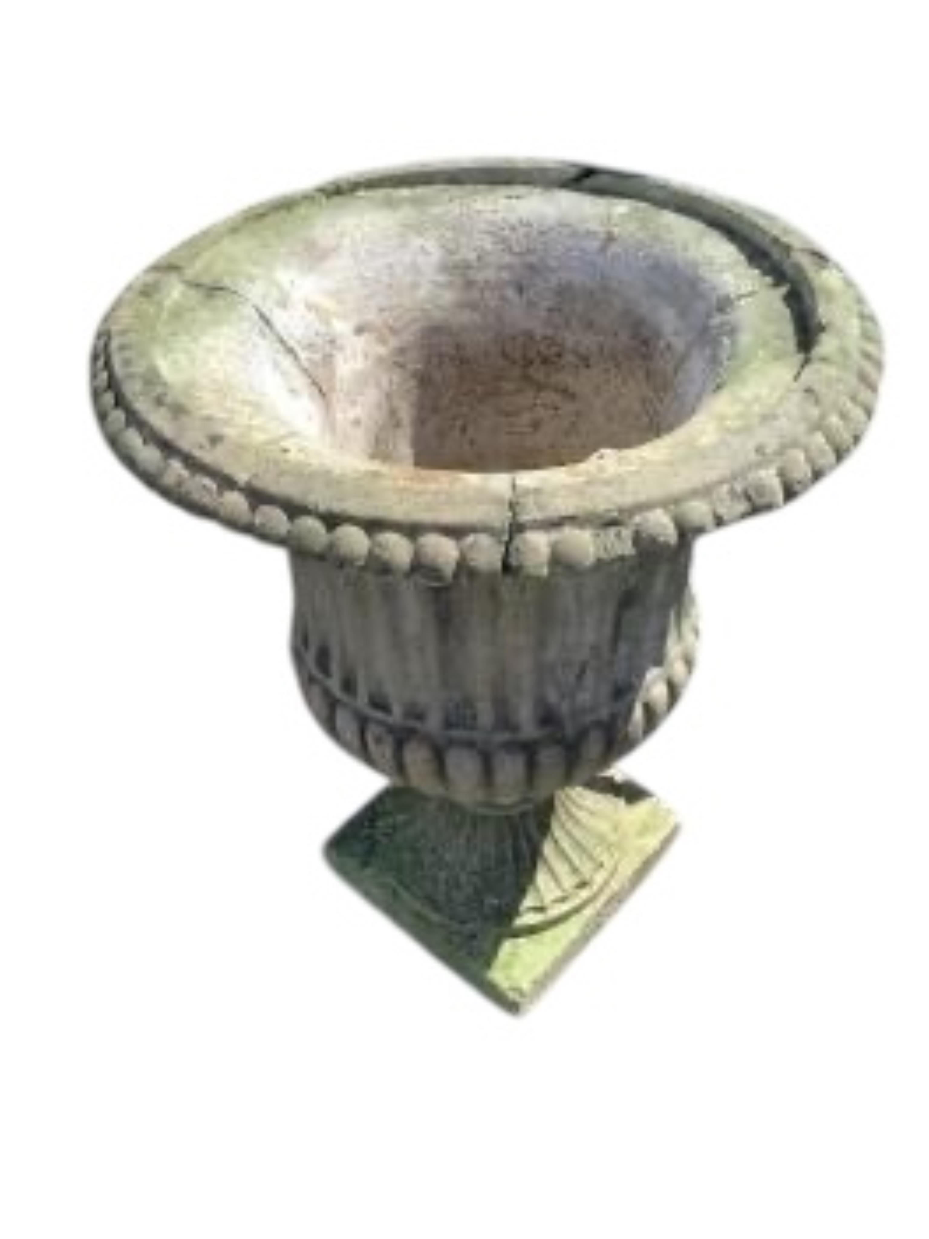 A pair of reconstituted stone campana garden urns on pedestal bases, diameter 46cm, height 58cm